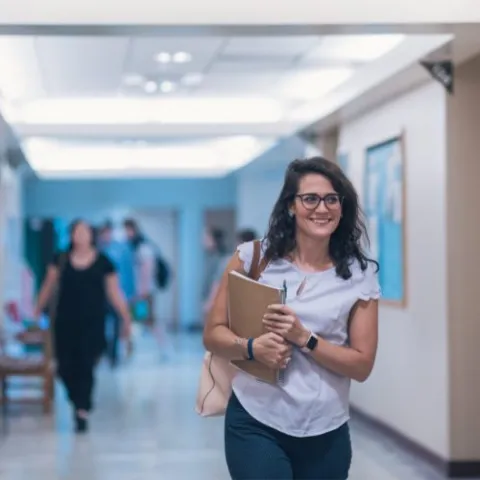 student walking in hallway