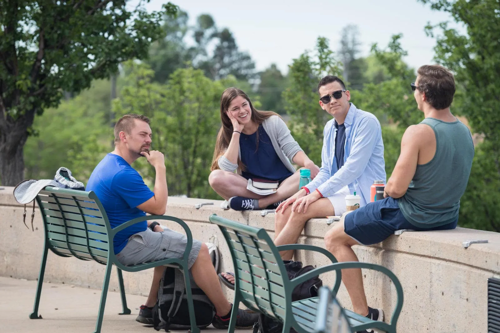 students hanging on out campus