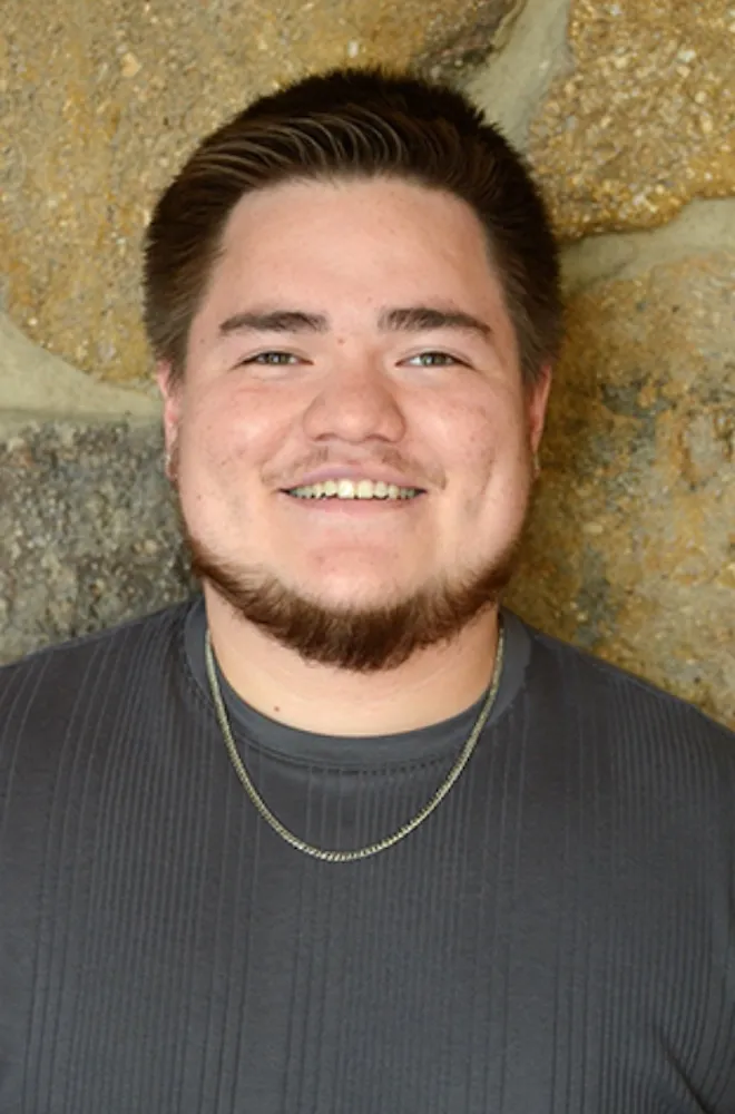 Headshot of Angello